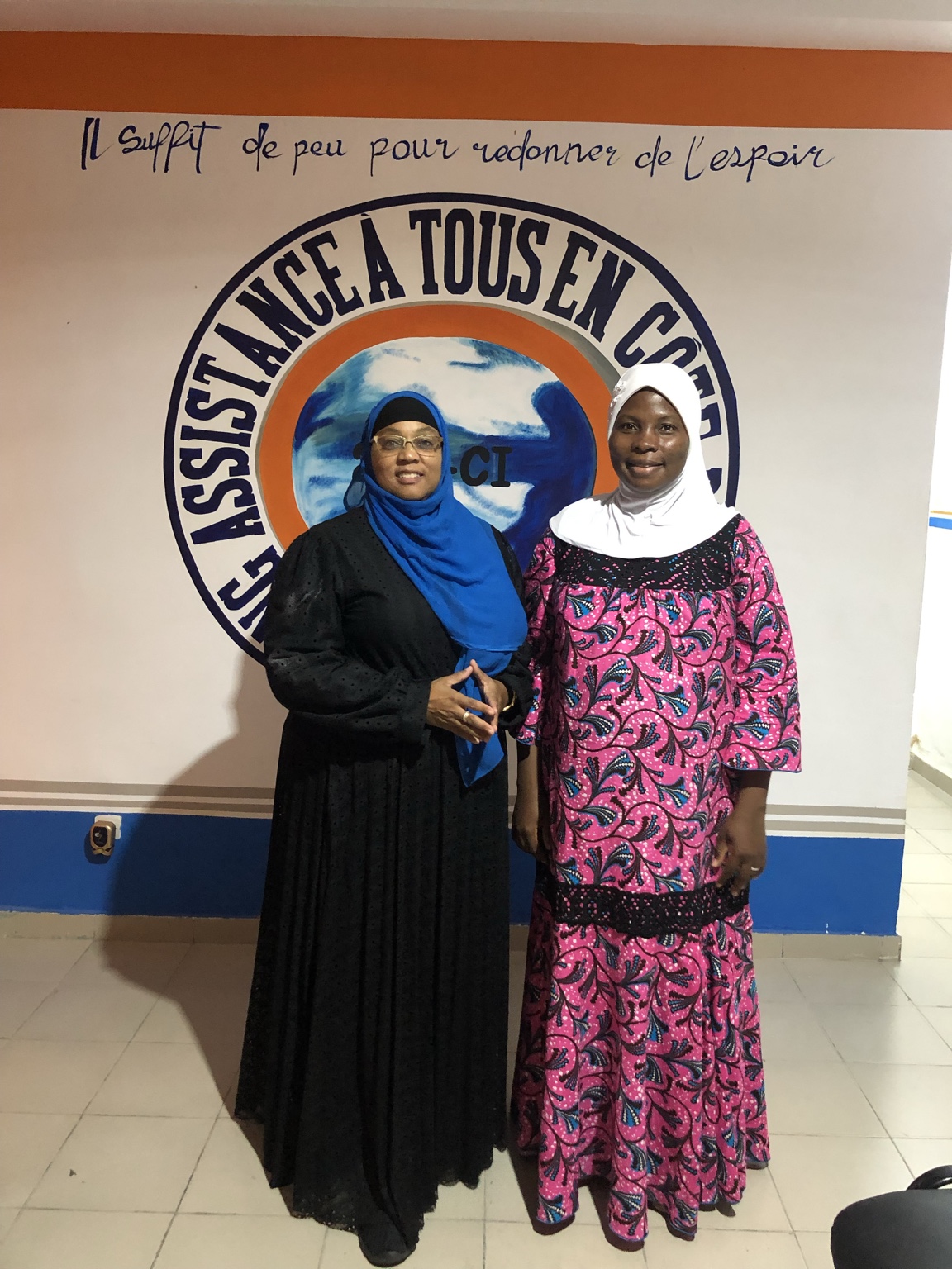 Two women together at the Assistance à Tous en Côte d’Ivoire office